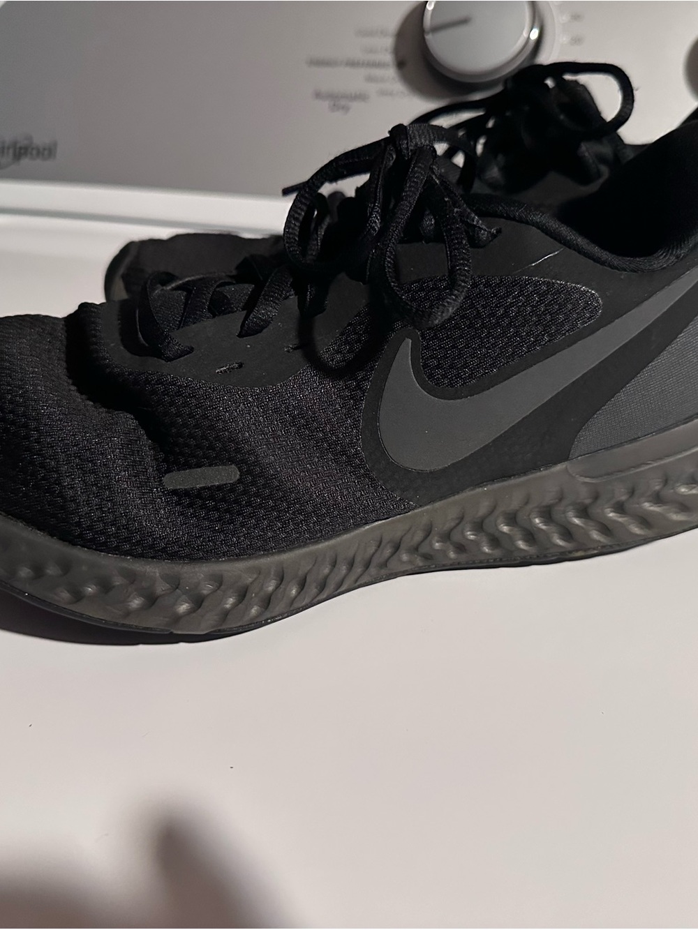 Nike Men's Black Athletic Running Shoes with Gray Swoosh, Revolutions